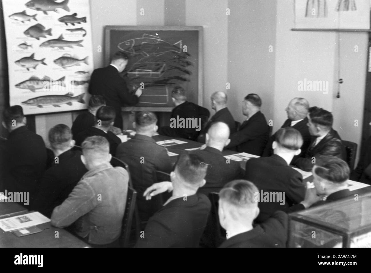 Fishery engineers doing a tutorial at the Reichsanstalt fuer Fischerei in Berlin, Germany 1930s. Stock Photo