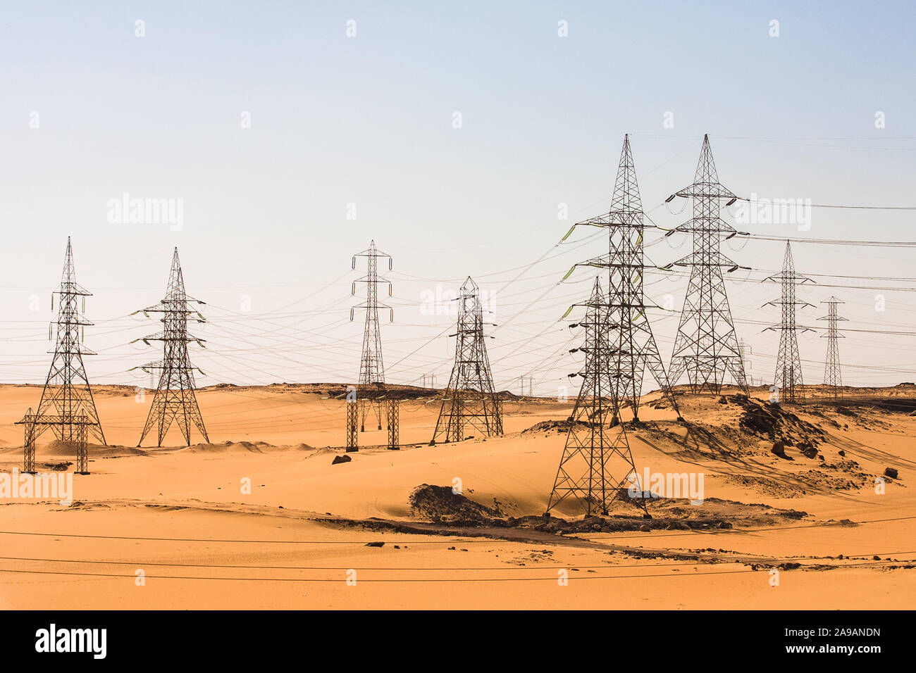 Aswan, Egypt, May 1, 2008: Overhead power lines in the desert near Aswan. Stock Photo