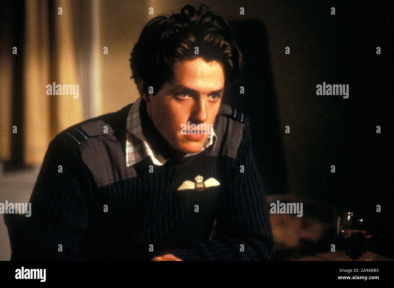 HUGH GRANT in THE LAIR OF THE WHITE WORM (1988), directed by KEN RUSSELL. Copyright: Editorial use only. No merchandising or book covers. This is a publicly distributed handout. Access rights only, no license of copyright provided. Only to be reproduced in conjunction with promotion of this film. Credit: WHITE WORM/VESTRON / Album Stock Photo