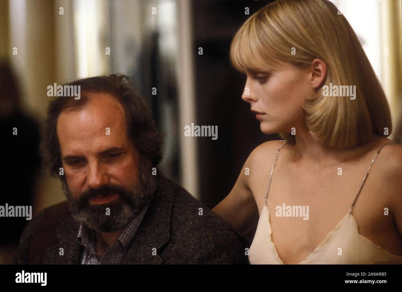 MICHELLE PFEIFFER and BRIAN DE PALMA in SCARFACE (1983), directed by BRIAN DE PALMA. Credit: UNIVERSAL PICTURES / Album Stock Photo