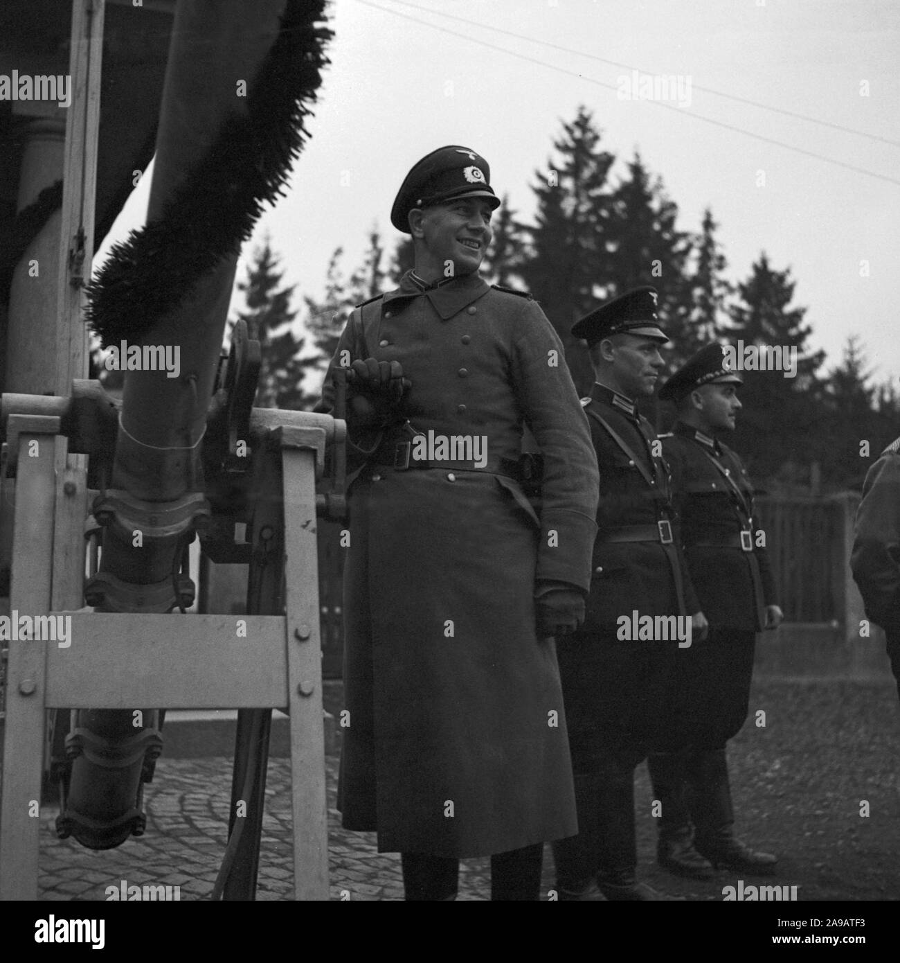 Guard at the barrier adoring Fuehrer and chancellor Adolf Hitler visiting the city of Asch in Sudetenland county, Germany 1930s. Stock Photo
