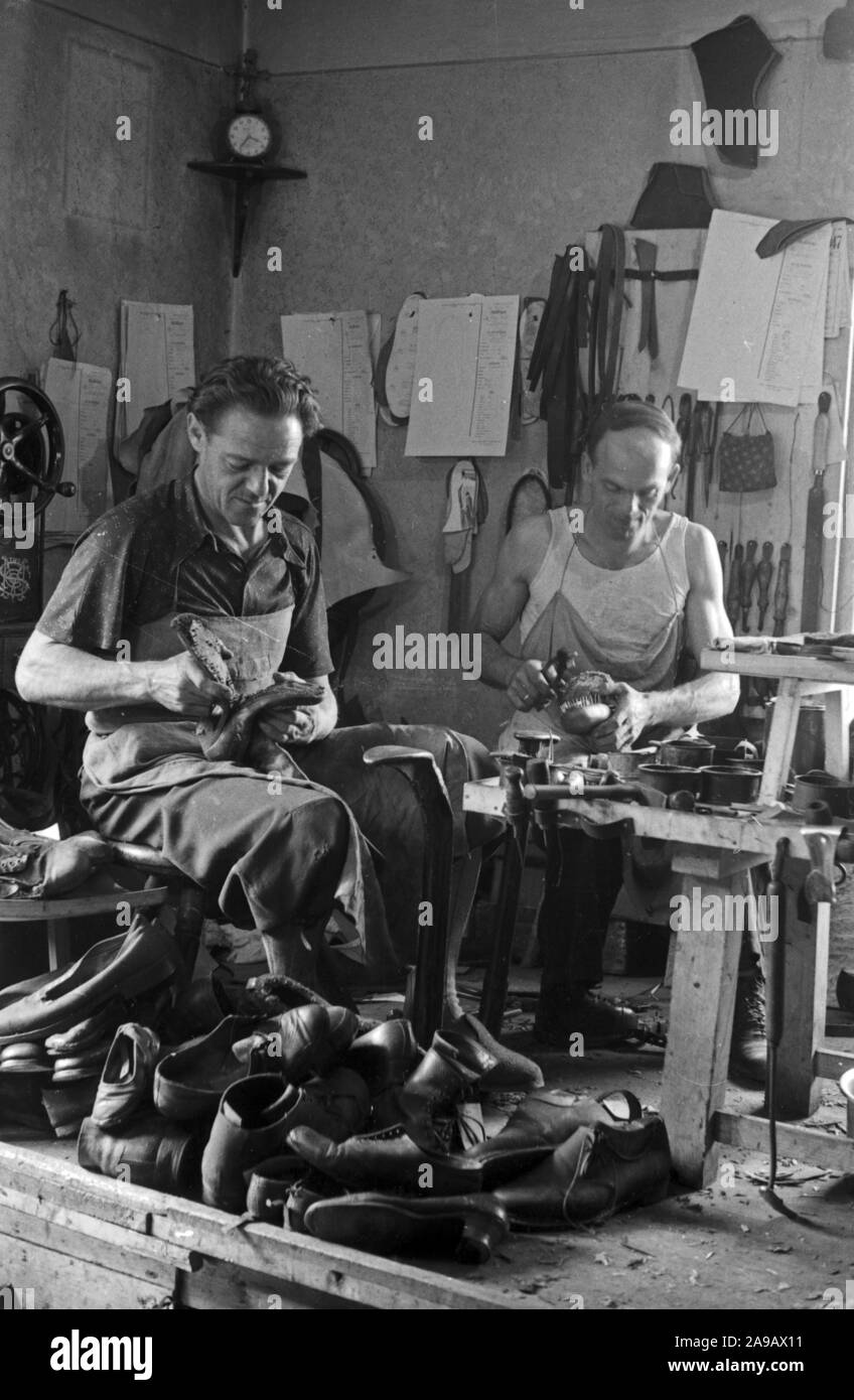 Shoemaker at work, Germany 1940s Stock Photo - Alamy