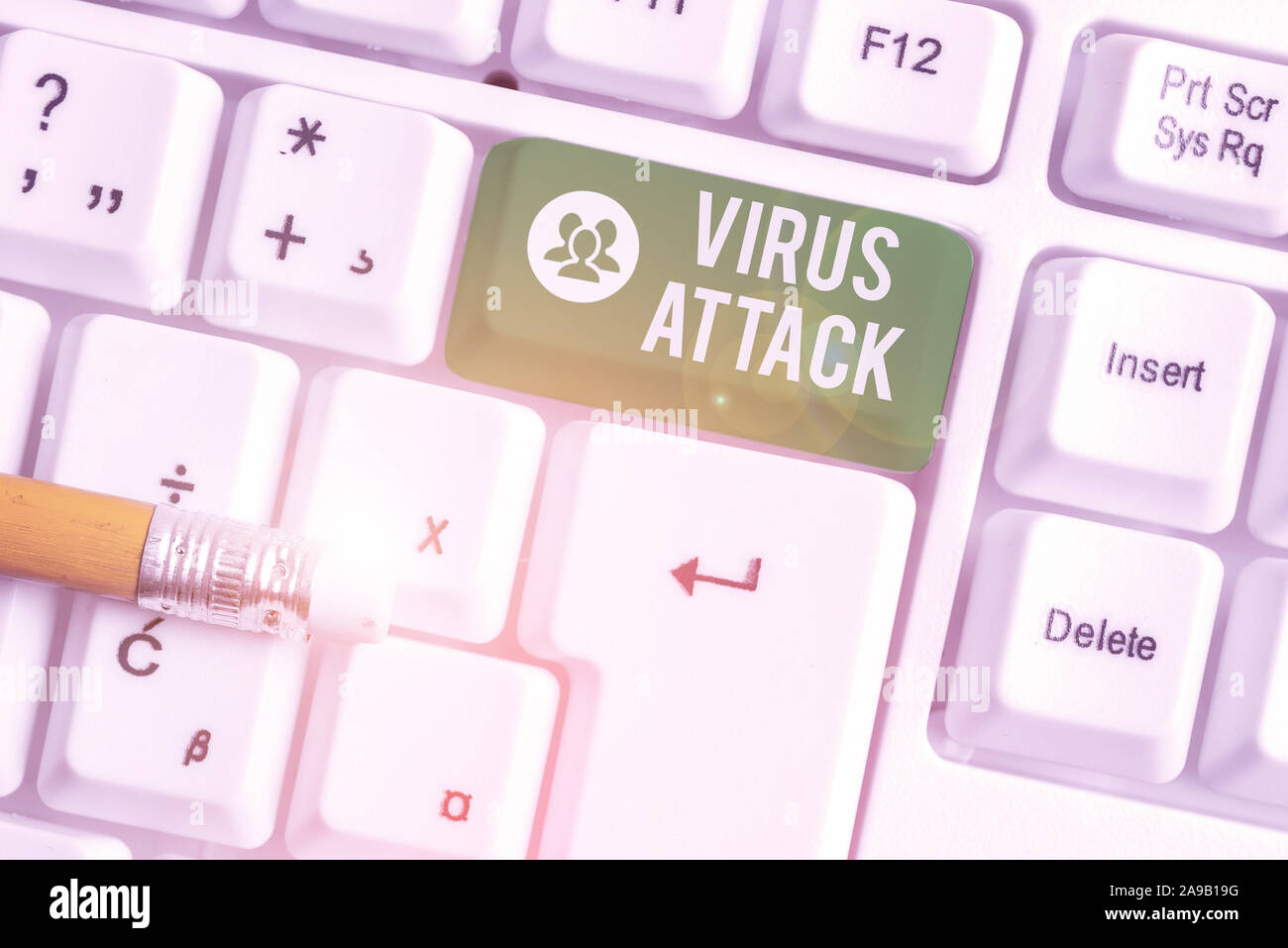 Handwriting text writing Virus Attack. Conceptual photo malicious program that perform actions unauthorized by the user White pc keyboard with empty n Stock Photo