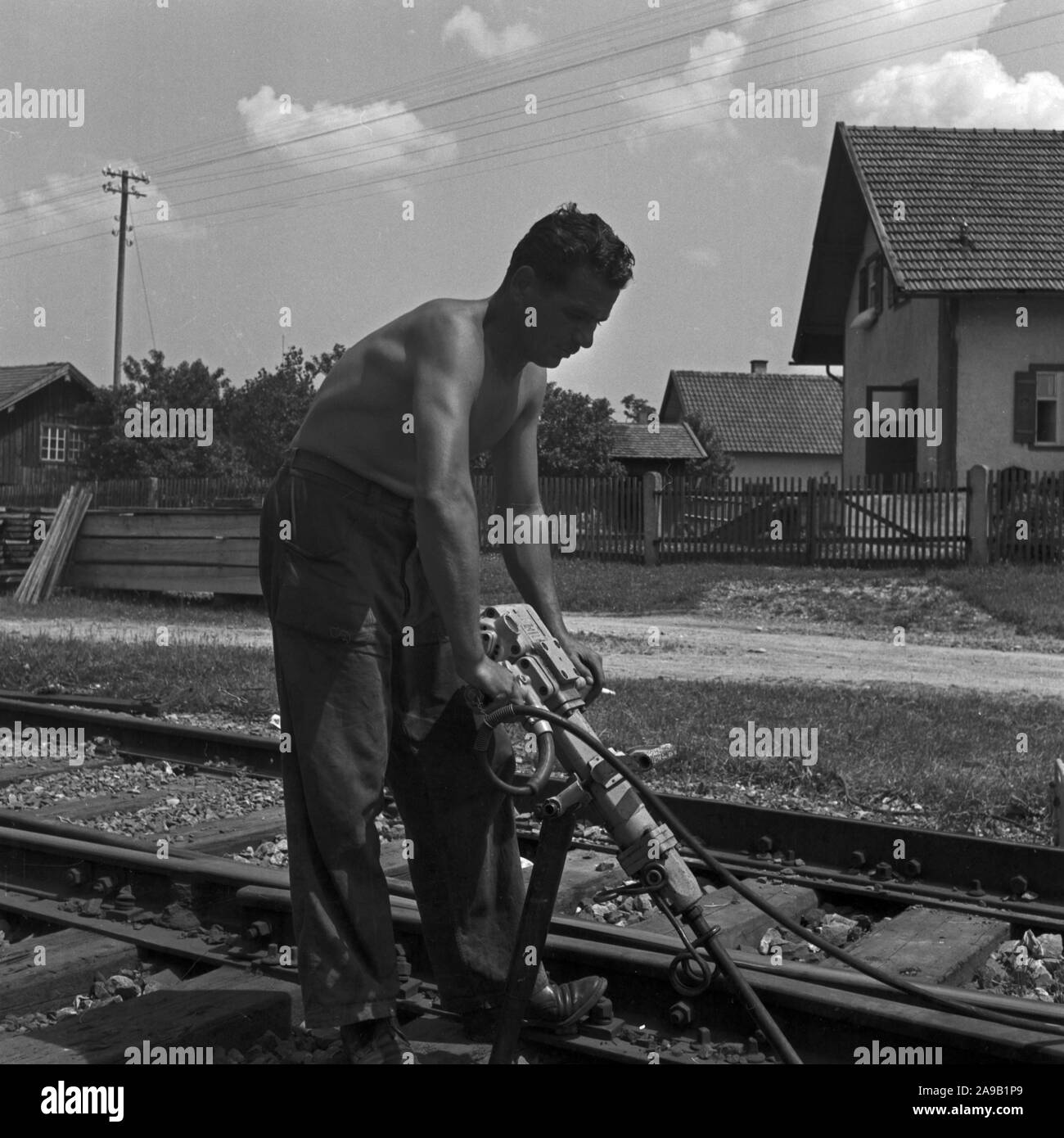 A man working with his jack hammer near Nuremberg, Germany 1950s Stock