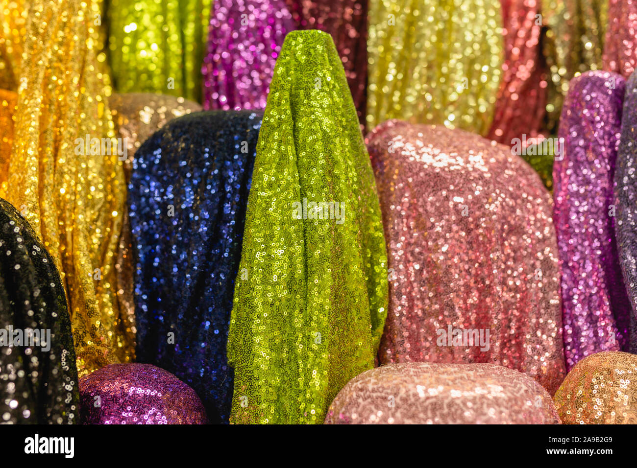 Sequins fabric with sequins colorful in the fabric stores. Stock Photo