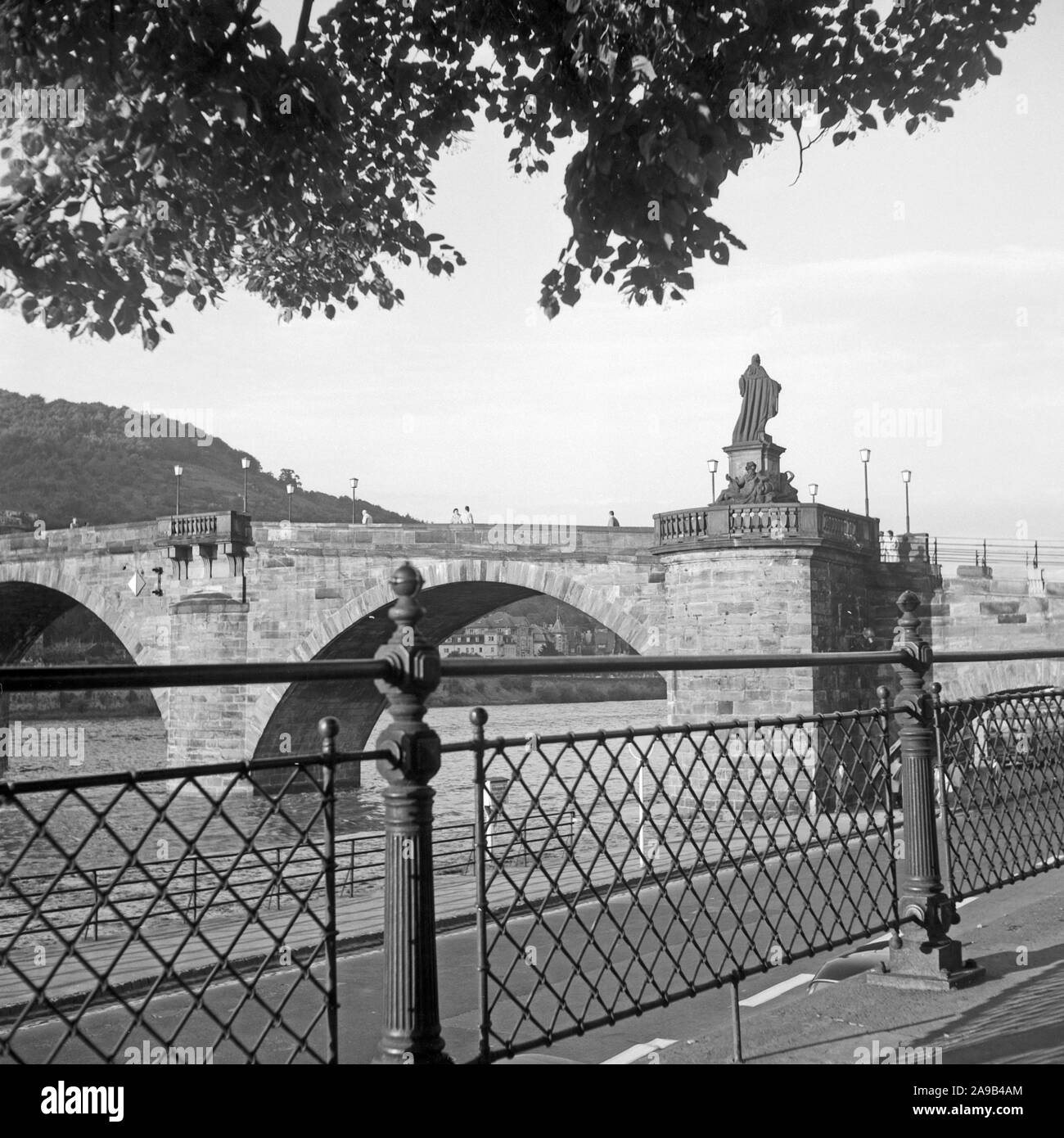 Old bridge over river Neckar at Heidelberg, Germany 1956 Stock Photo