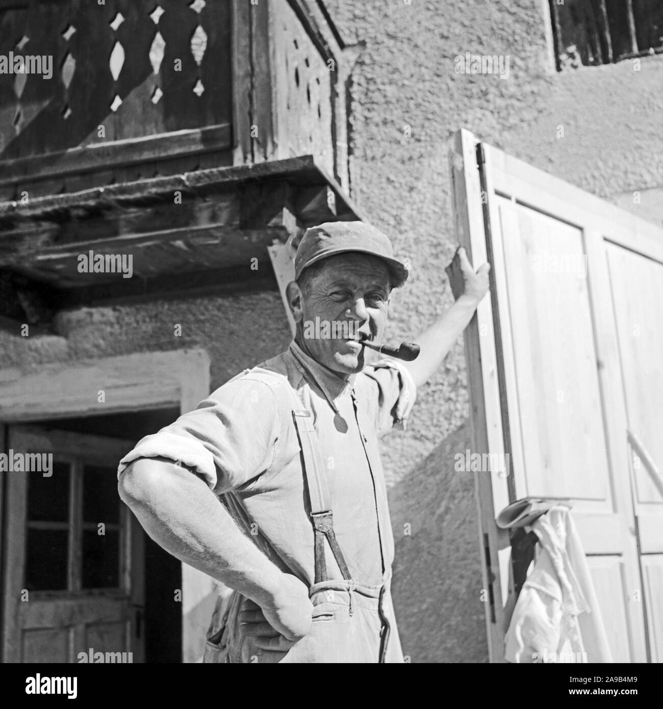 Happy farmworker, Germany 1958 Stock Photo