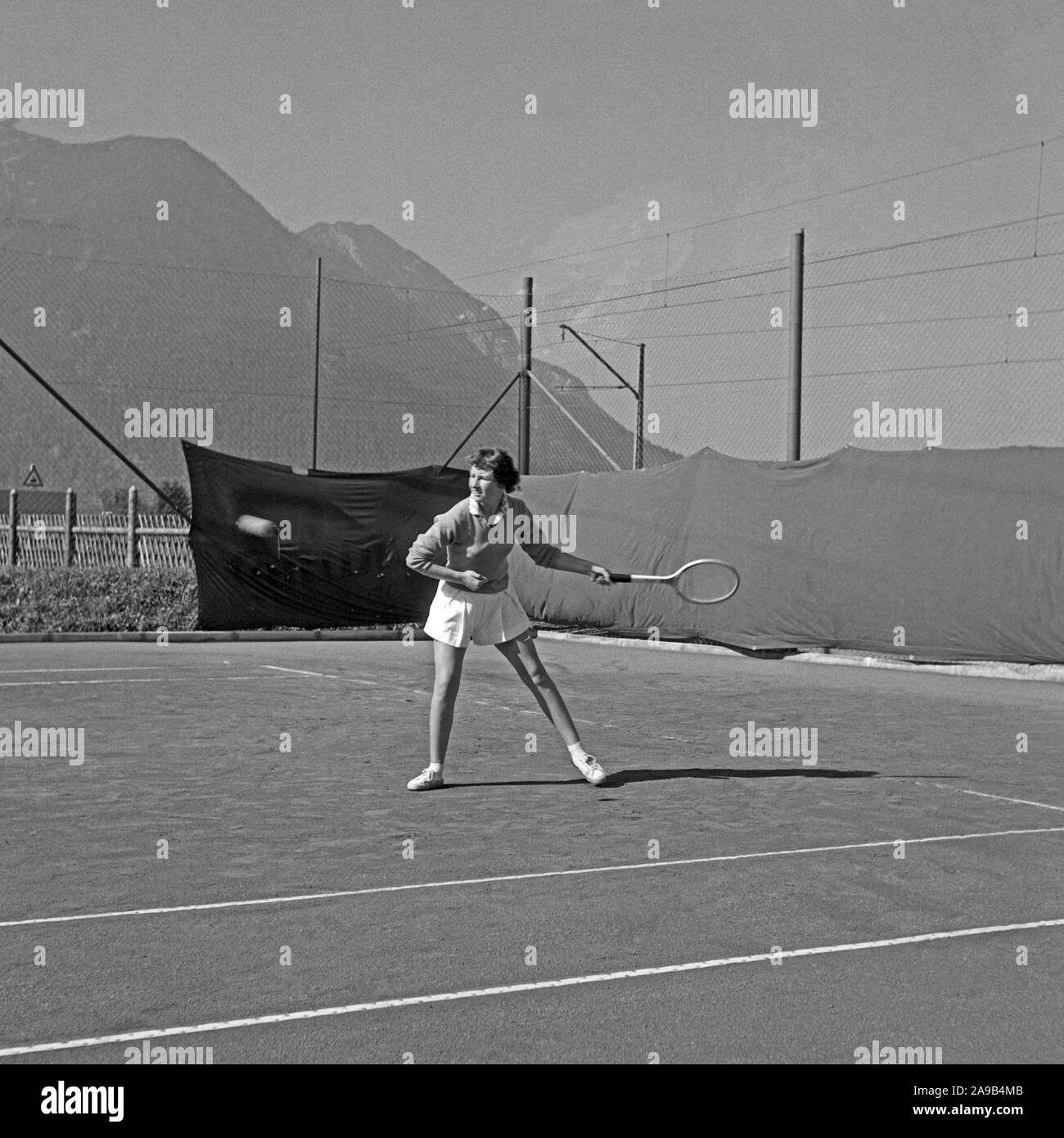 A young woman playing tennis, Germany 1959 Stock Photo Alamy