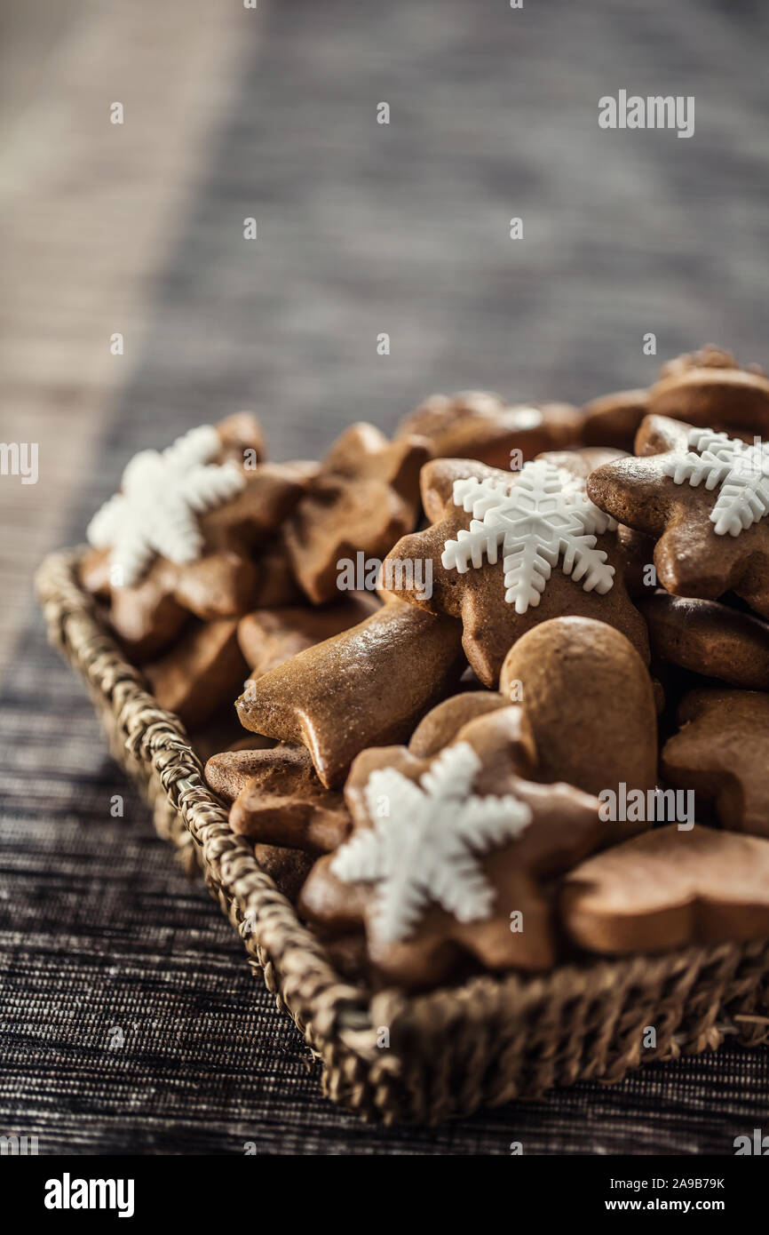 Gingerbread christmas cookies on kitchen table - Close-up. Stock Photo