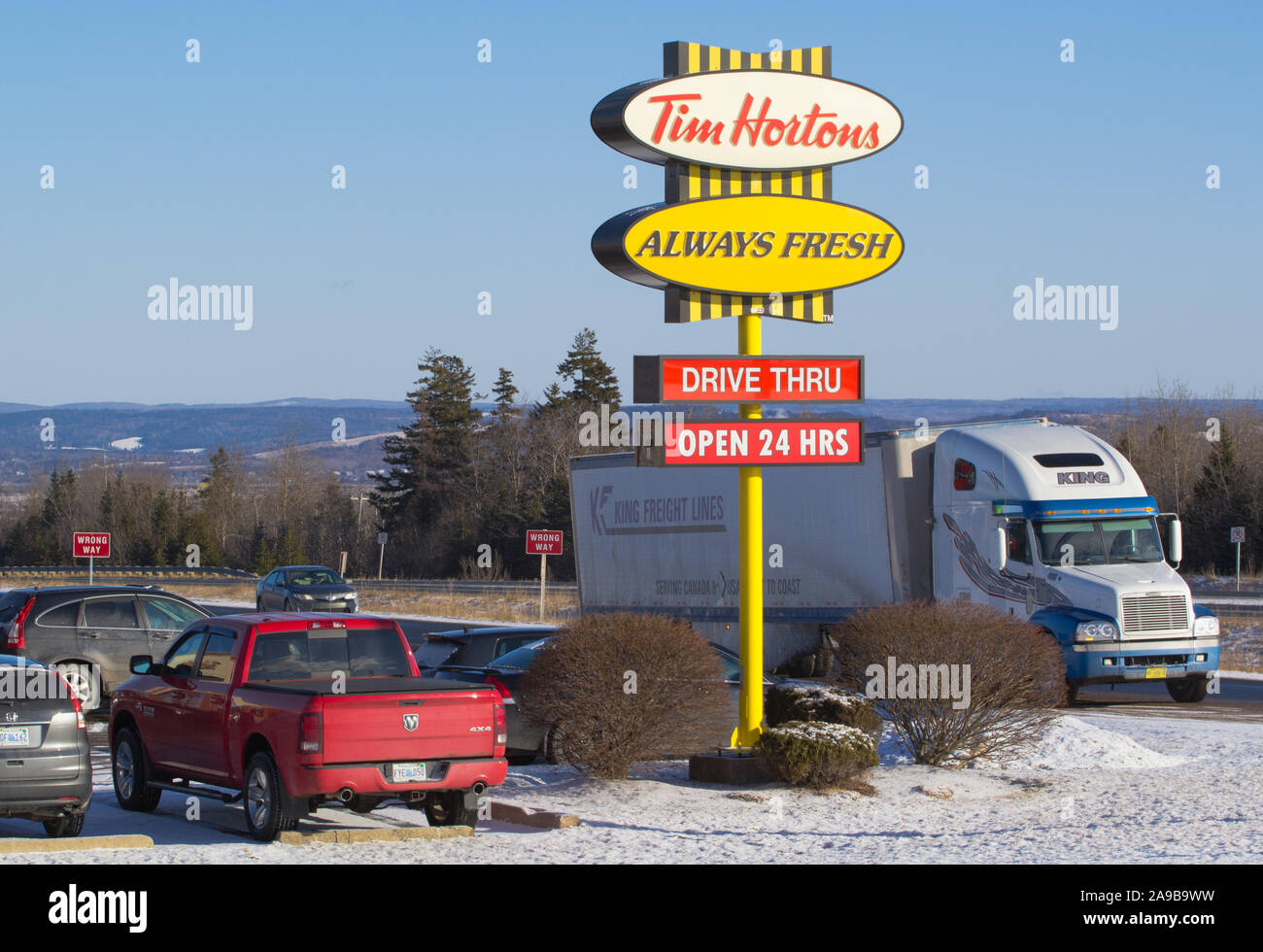Truro, Canada - February 09, 2018: Tim Hortons sign beside highway 102, Nova Scotia. Tim Hortons is a Canadian restaurant chain known for its coffee a Stock Photo