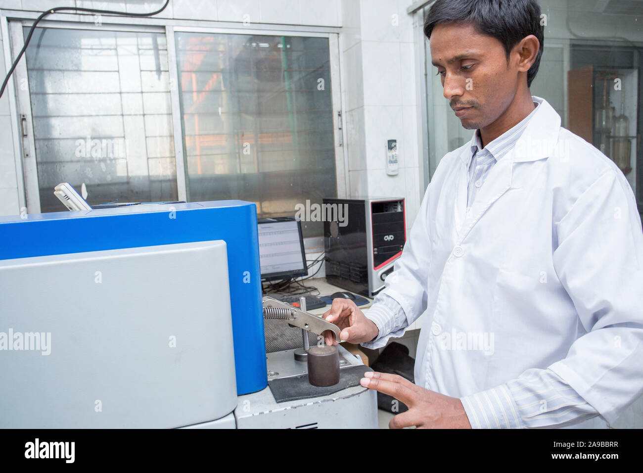 Bangladesh May 19, 2015 A factory lab operator using Steel rod