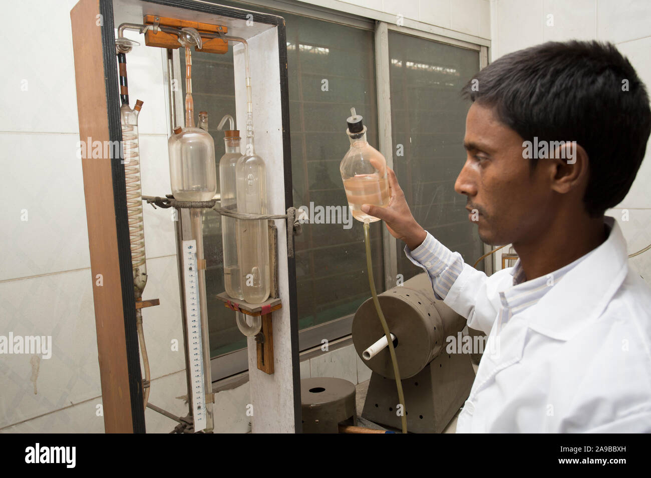 Bangladesh May 19, 2015 A factory lab operator using Steel rod