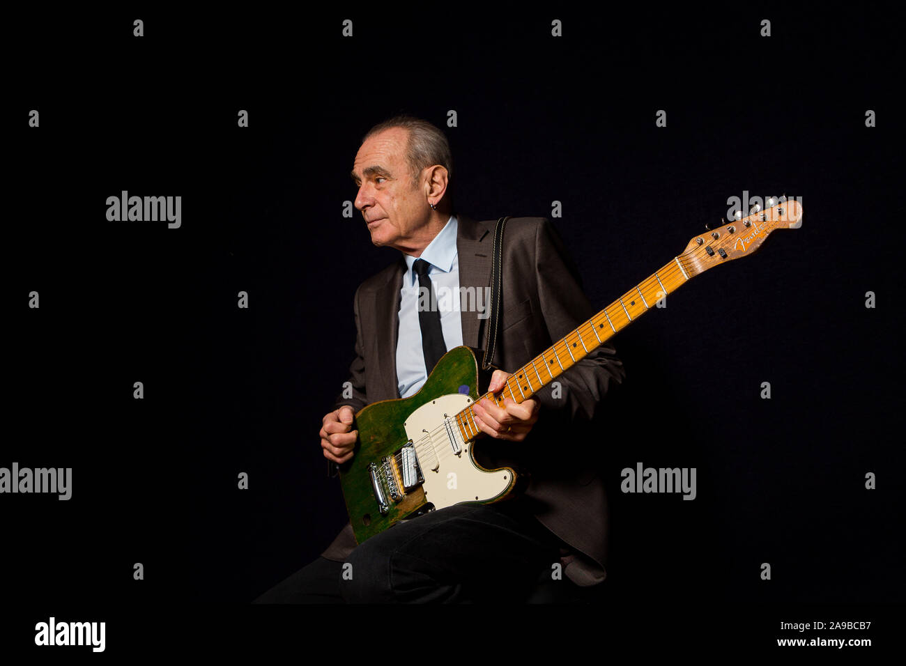 Status Quo frontman Francis Rossi OBE plays his green Fender Telecaster in  London Stock Photo - Alamy