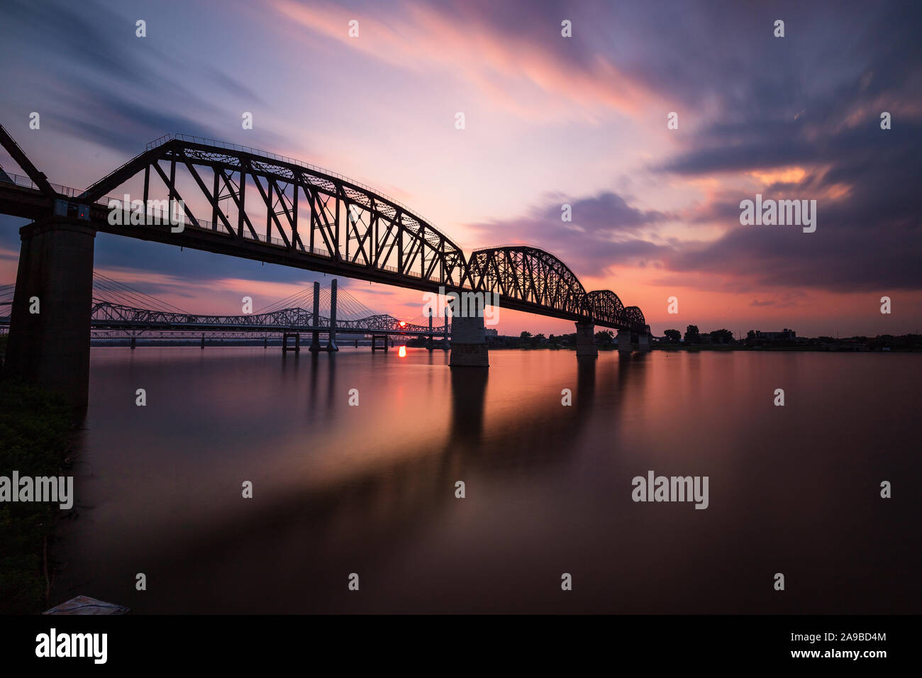 A long exposure sunset of the Big Four Bridge, which is a walking