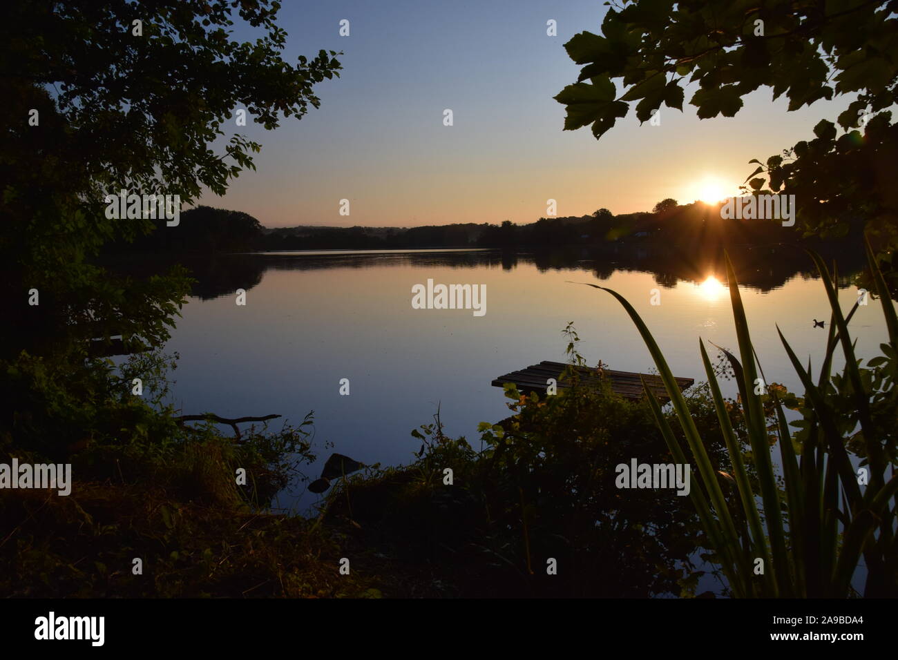 Sunrise over Carr Mill Dam St Helens Merseyside Stock Photo Alamy