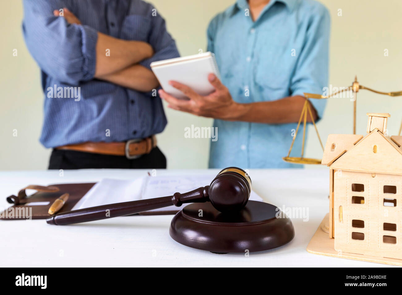 Judge gavel with lawyer bakground. Concepts of housing and real estate law. Stock Photo
