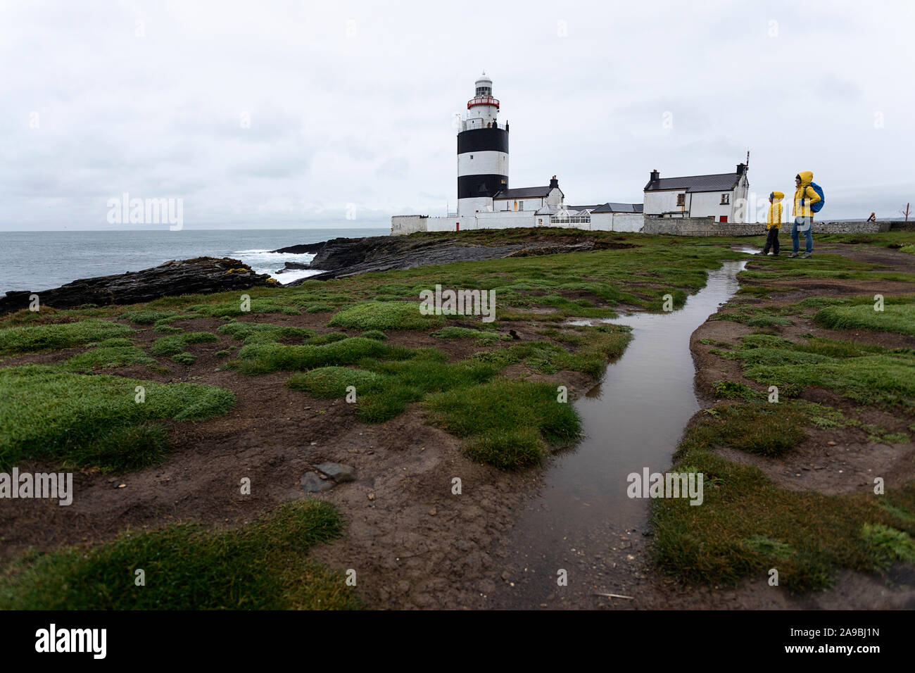 Mother and son at Hook Head Lighthouse in county Wexford, Ireland Stock