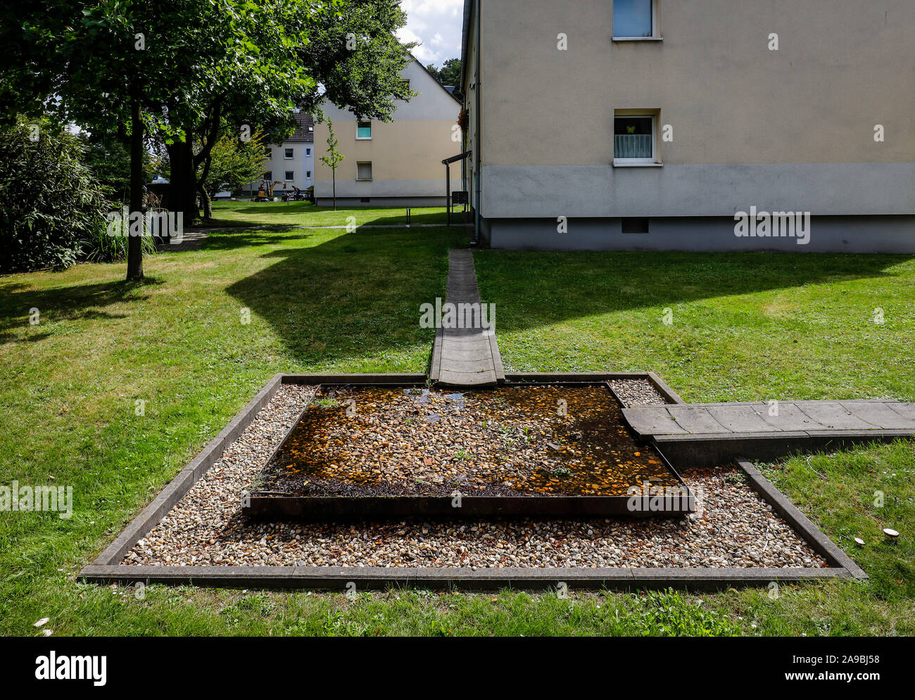 19.08.2019, Essen, North Rhine-Westphalia, Germany - Rainwater separation, the housing company Allbau has separated the rainwater from the sewage syst Stock Photo