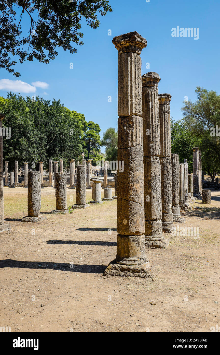05.09.2019, Olympia, Peloponnese, Greece - Antique Olympia, here colonnades with Doric columns of the wrestling school Palaestra. 00X190905D052CAROEX. Stock Photo
