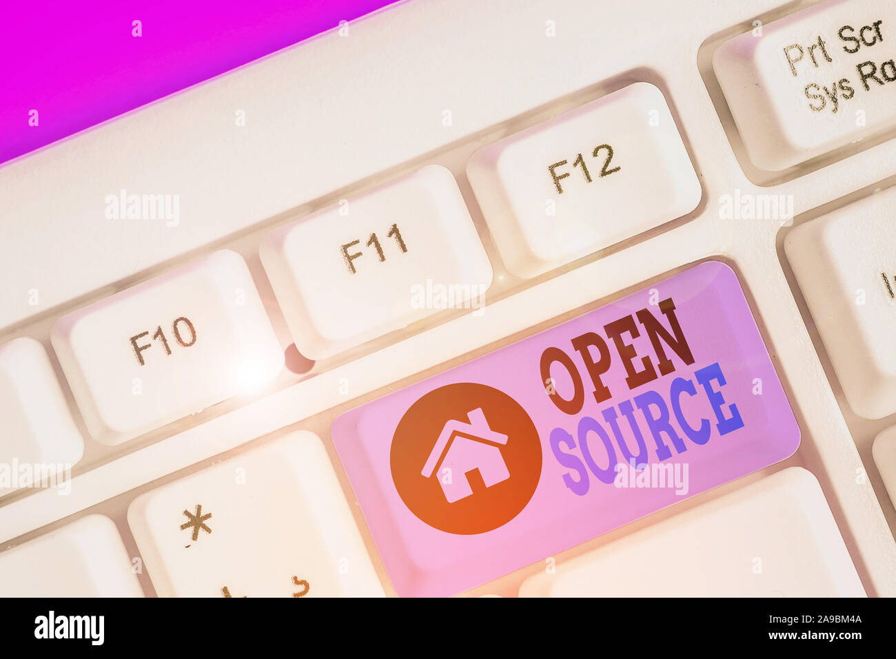 Writing note showing Open Source. Business concept for denoting software which original source code is made free Stock Photo