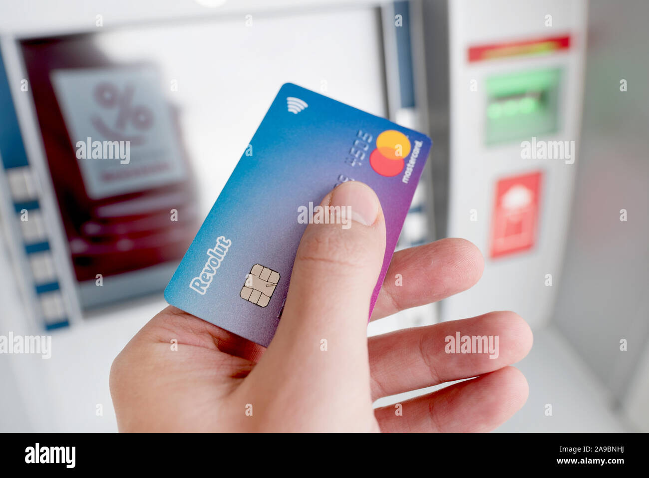 Mastercard credit card in hand hi-res stock photography and images - Alamy