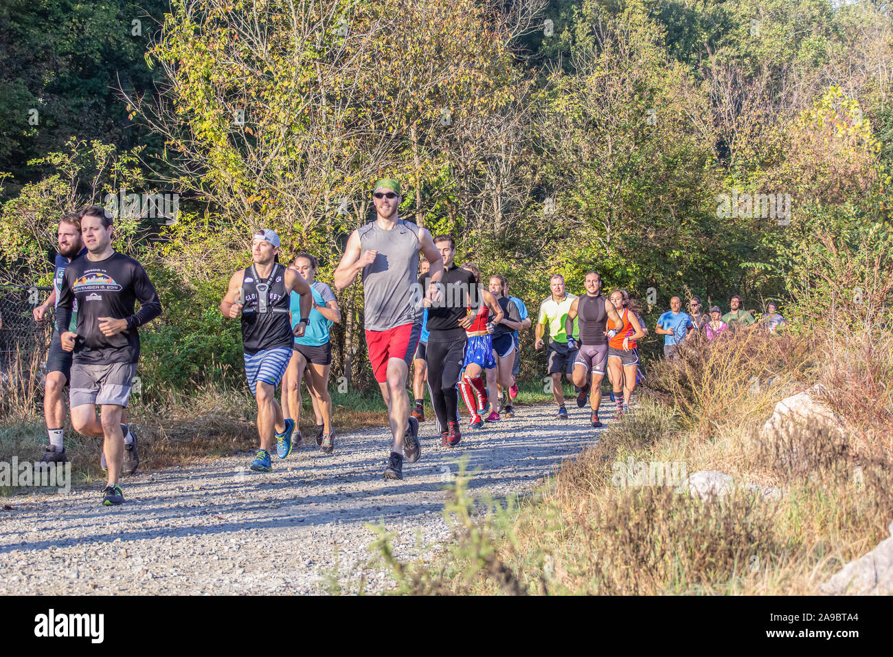 Runner competing in 'King of the James' triathlon. Stock Photo