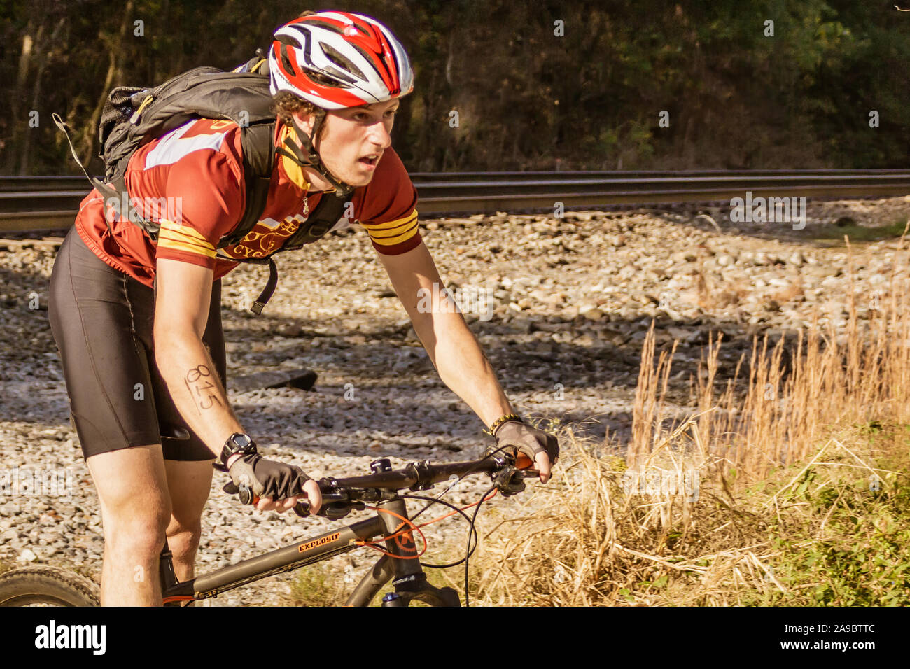 Cyclist competing in the 'King of the James' triathlon. Stock Photo
