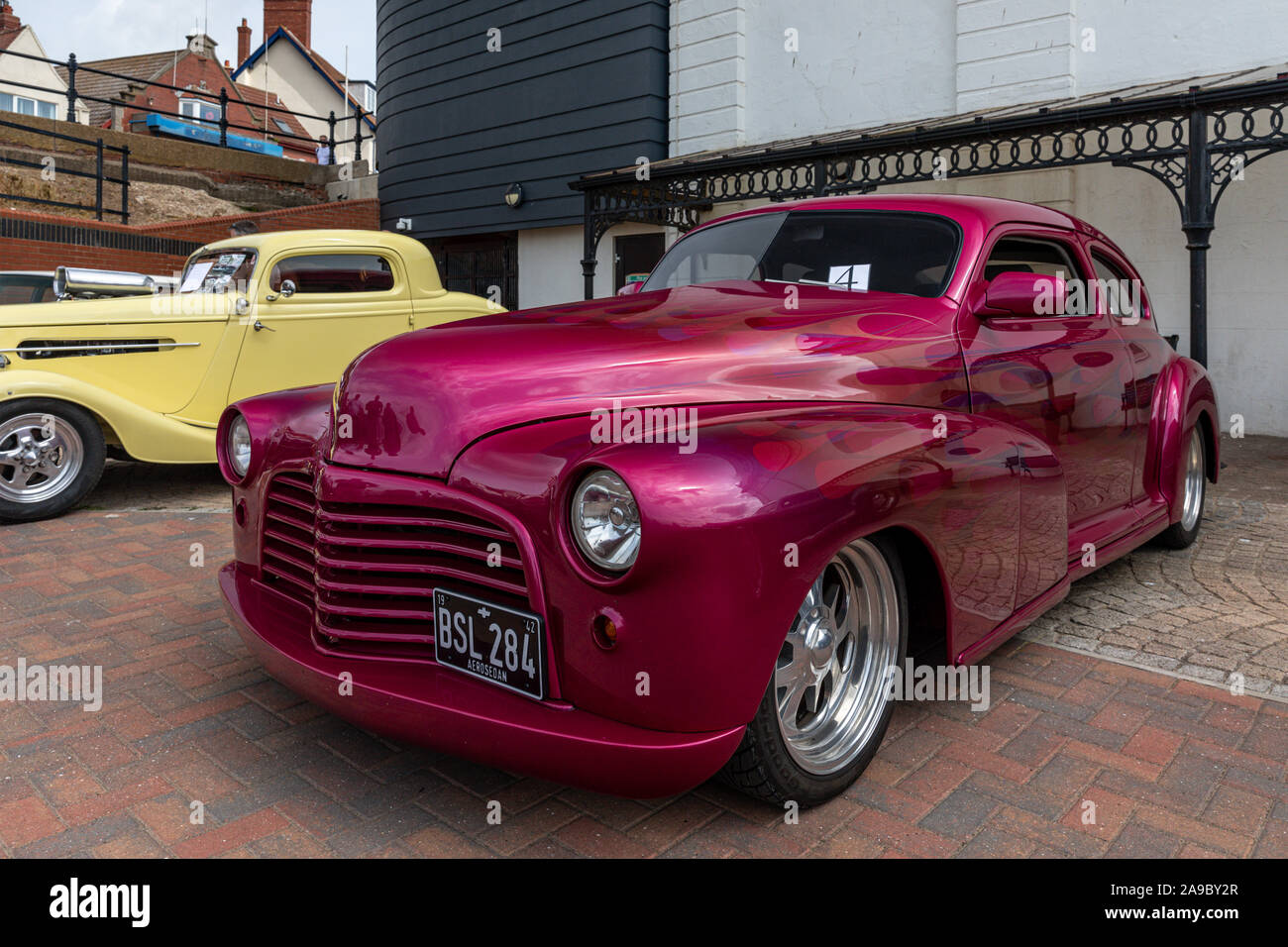 An American 1942 Chevrolet GMC custom car at 'Race the Waves' event, where cars and motorcycles drag race on the beach at Bridlington, East Yorkshire Stock Photo