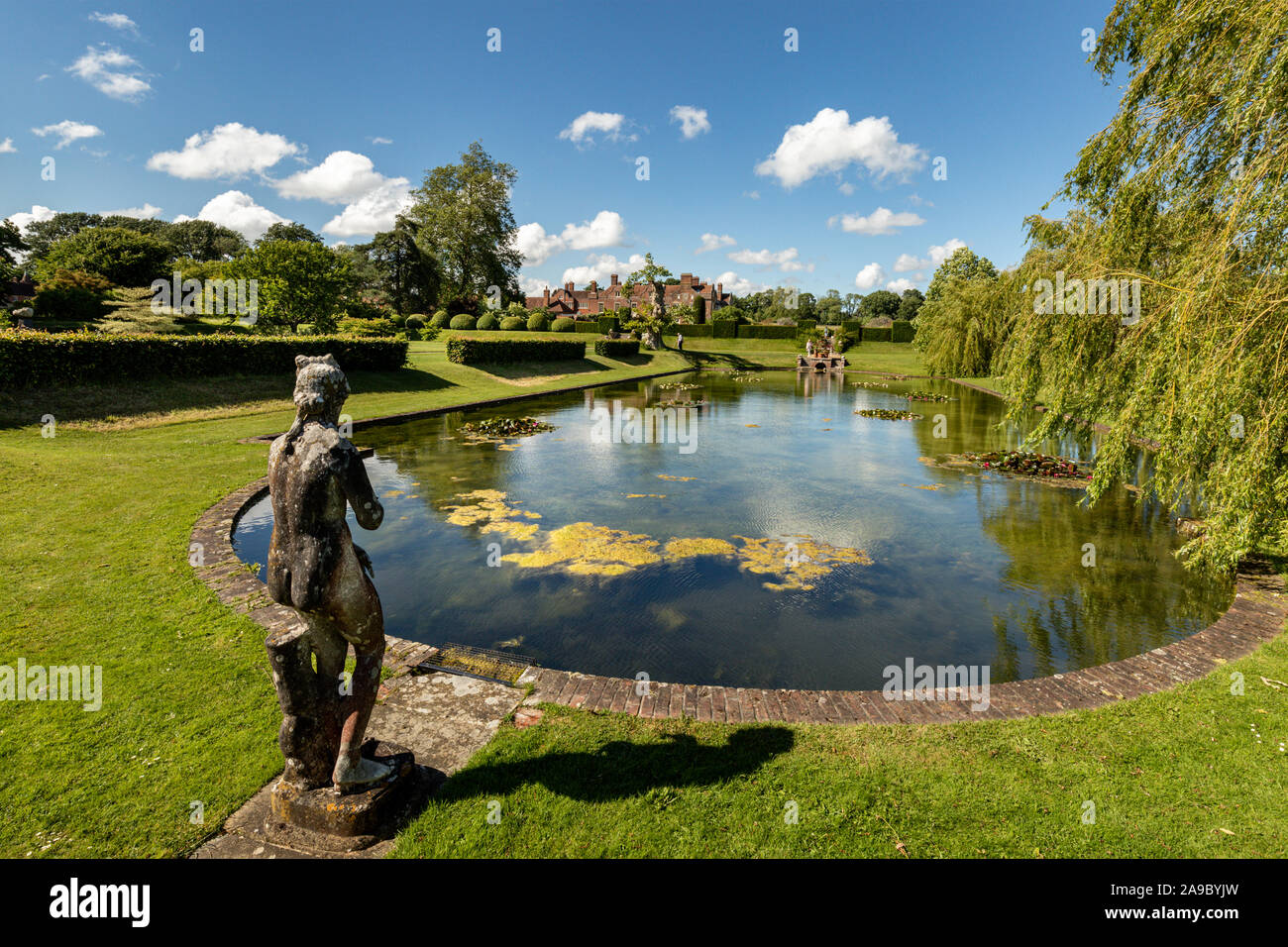 Ornamental statue and pond in the gardens of Godinton House & Gardens, Ashford, Kent Stock Photo