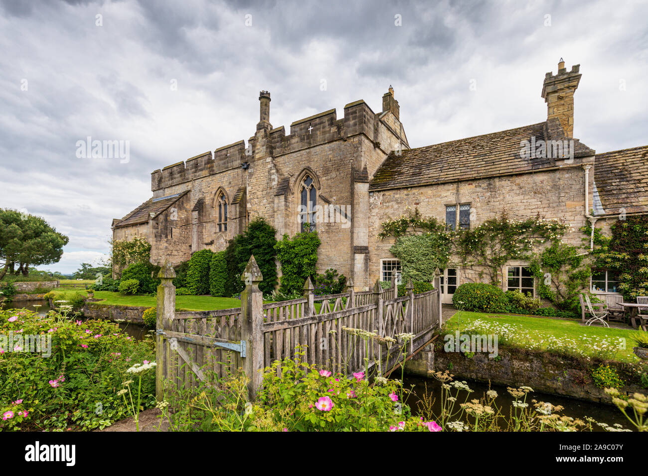 Markenfield Hall is a picturesque early 14th-century moated Medieval manor house about 3 miles south of Ripon, North Yorkshire, England. Stock Photo