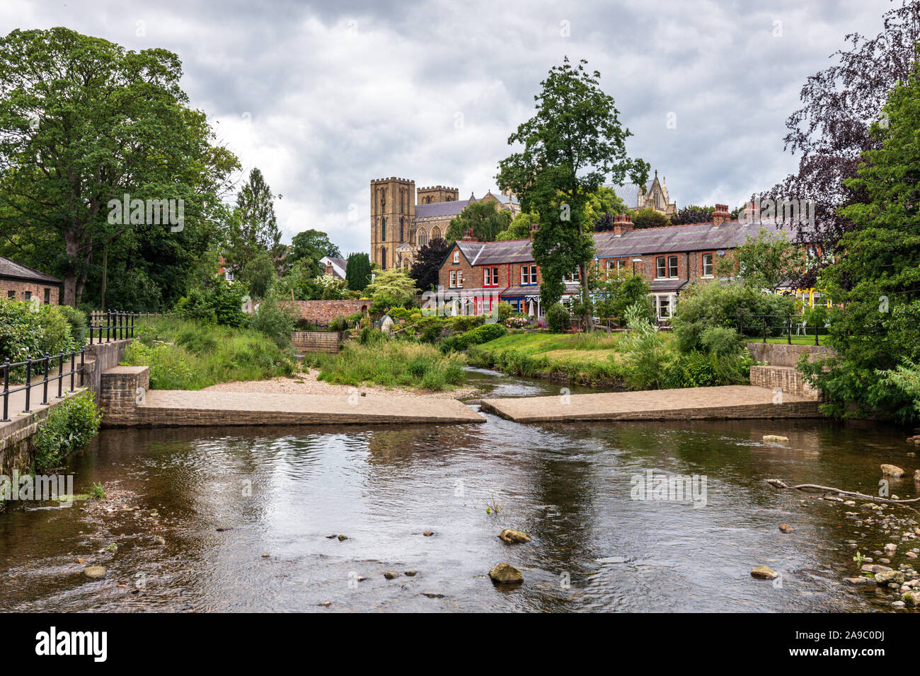 Alma weir on the River Skell, Ripon, a cathedral city in the Borough of Harrogate, North Yorkshire, England. Stock Photo