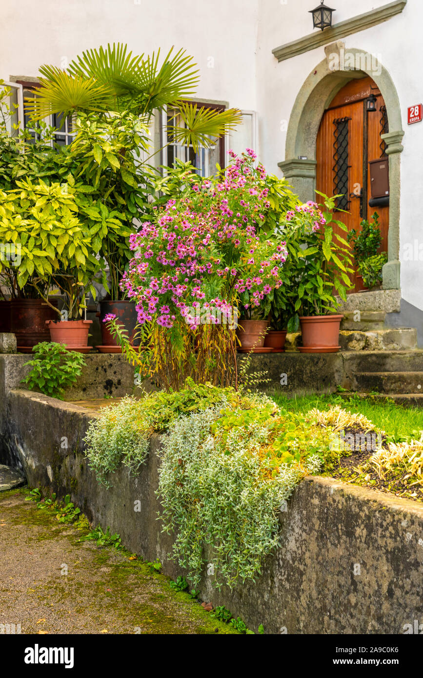 The village of Kropa, Slovenia with fall foliage color Stock Photo - Alamy