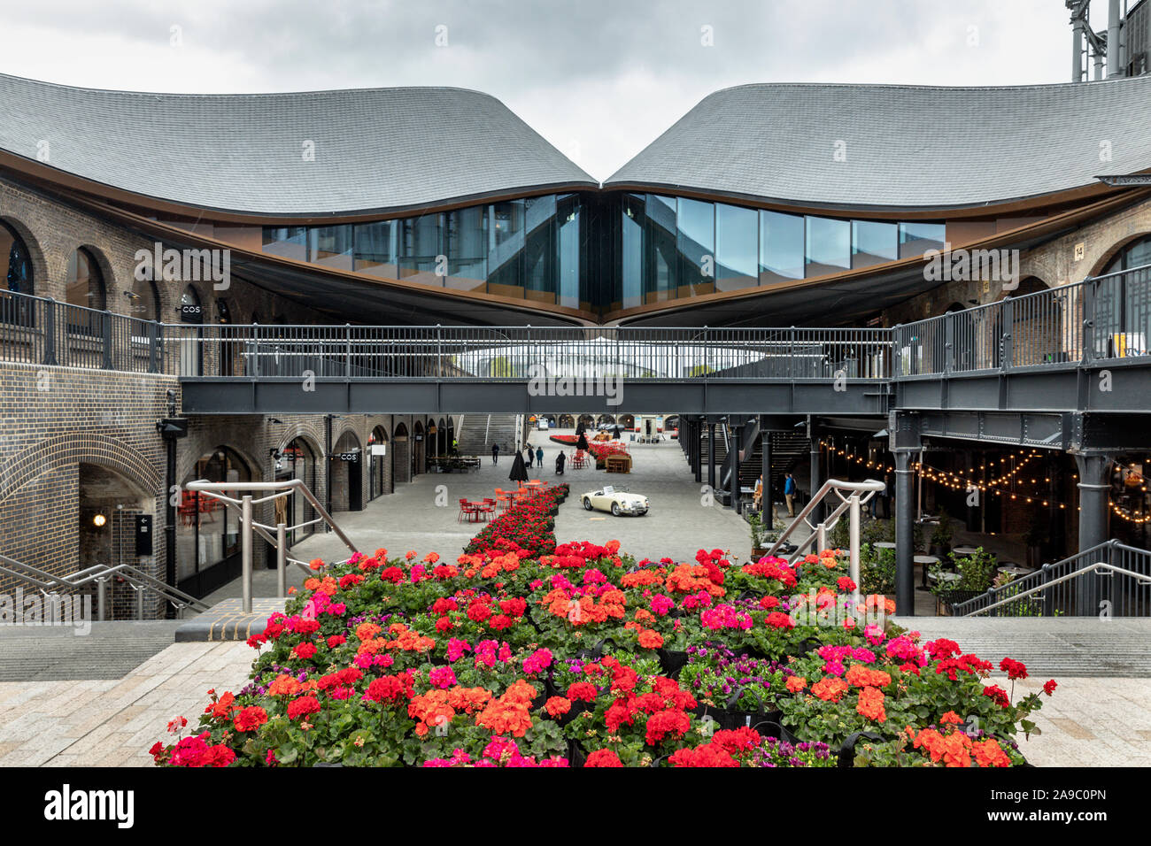 Coal Drops Yard, Kings Cross, a retail and lifestyle area made from converted Victorian industrial buildings in King’s Cross, London, UK Stock Photo