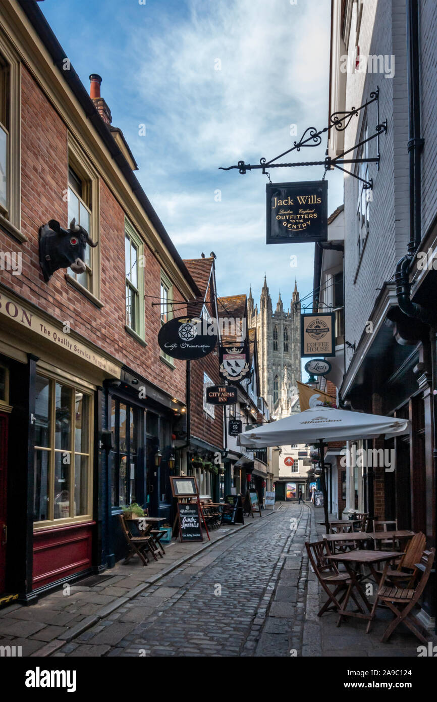 A side street in the historic cathedral city of Canterbury, with the Cathedral in the background, Kent, southeast England, UK Stock Photo