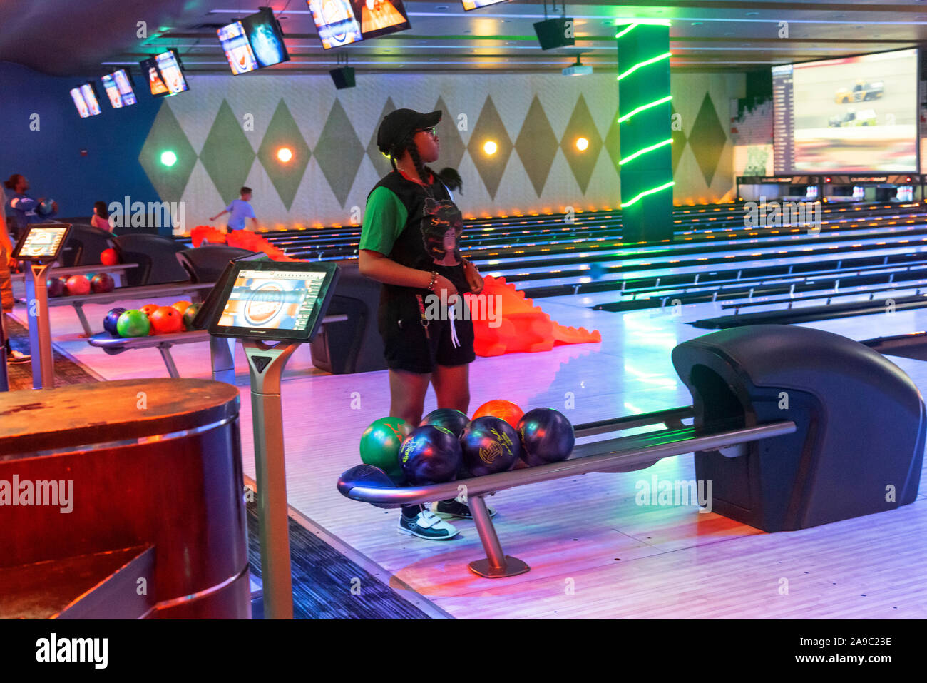 A pretty African Americans girl play Bowling, Philadelphia, Pennsylvania, USA Stock Photo