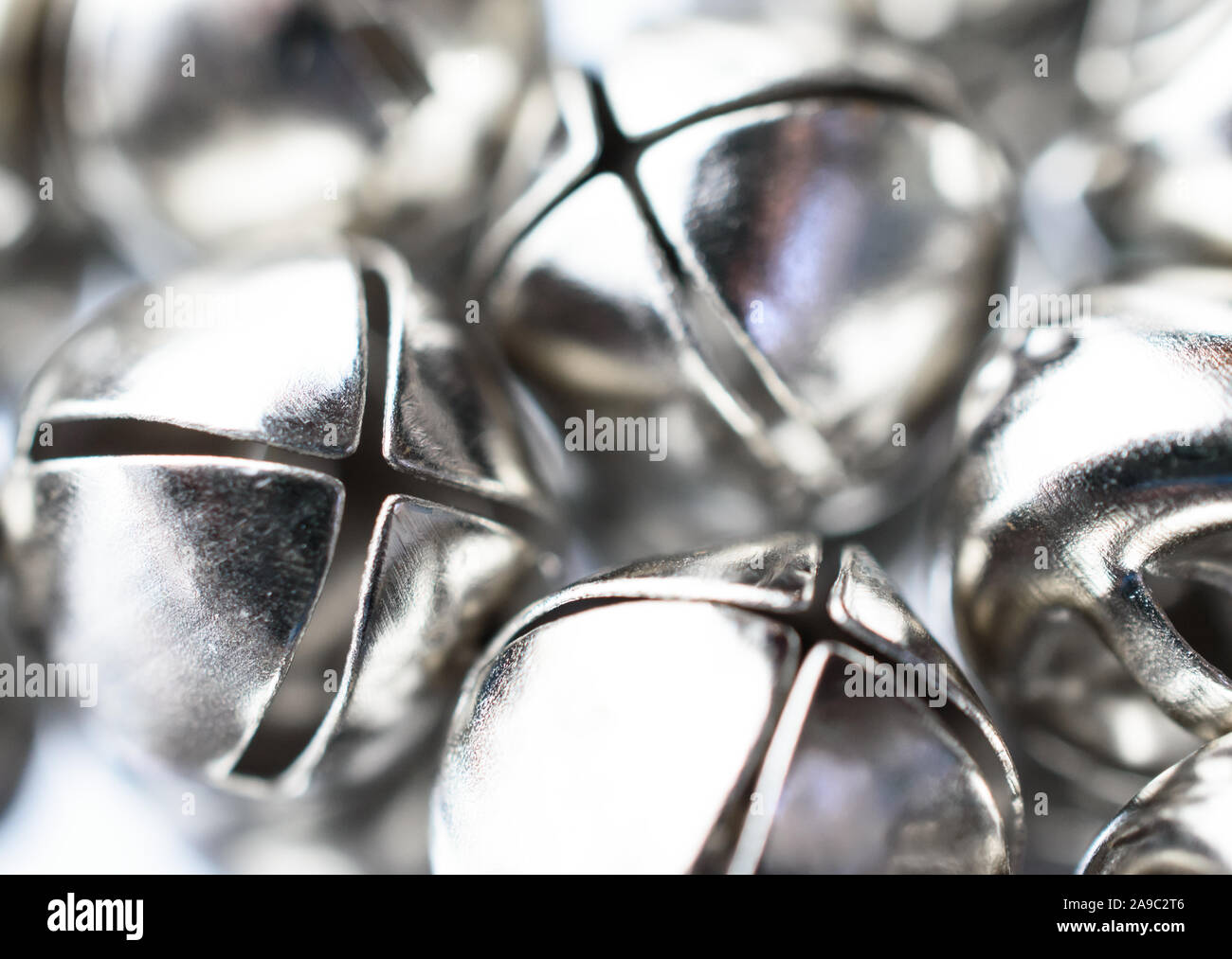 Closeup of Silver Christmas Jingle Bells Stock Photo