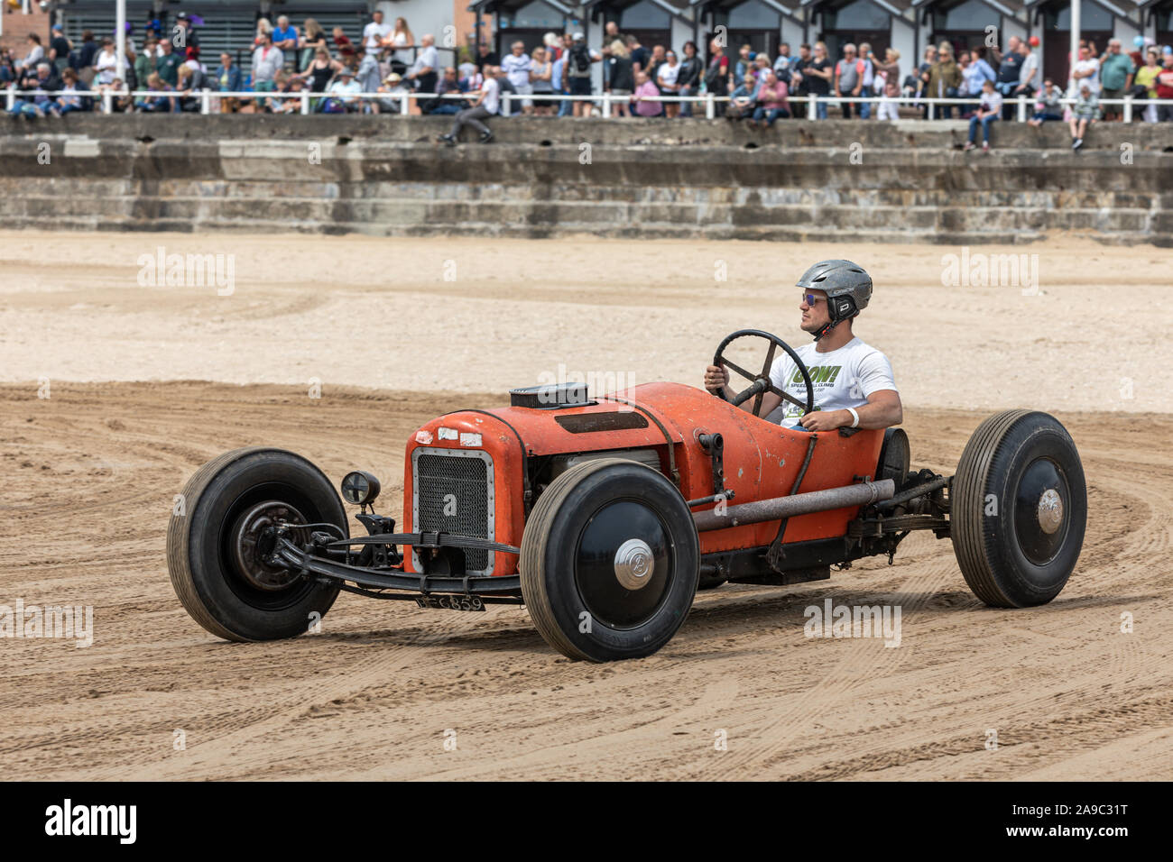 A vintage hot rod at the "Race the Waves" event, where cars and