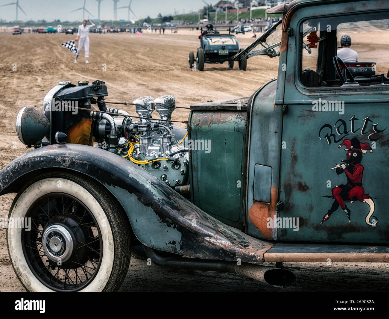 Vintage hot rods line up at the 'Race the Waves' event, where cars and motorcycles drag race on the beach at Bridlington, East Yorkshire England UK Stock Photo