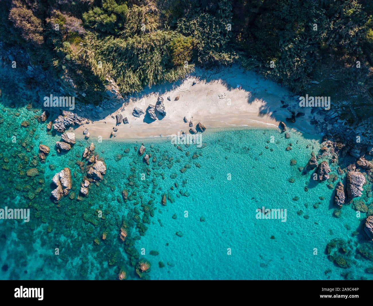 Aerial view of Tropea beach, crystal clear water and rocks that appear ...