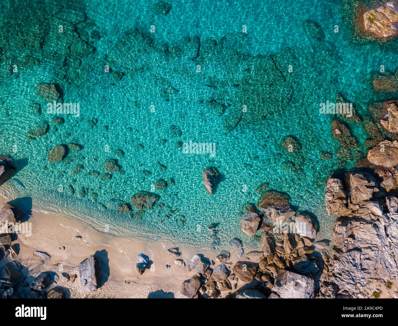 Aerial view of Tropea beach, crystal clear water and rocks that appear ...