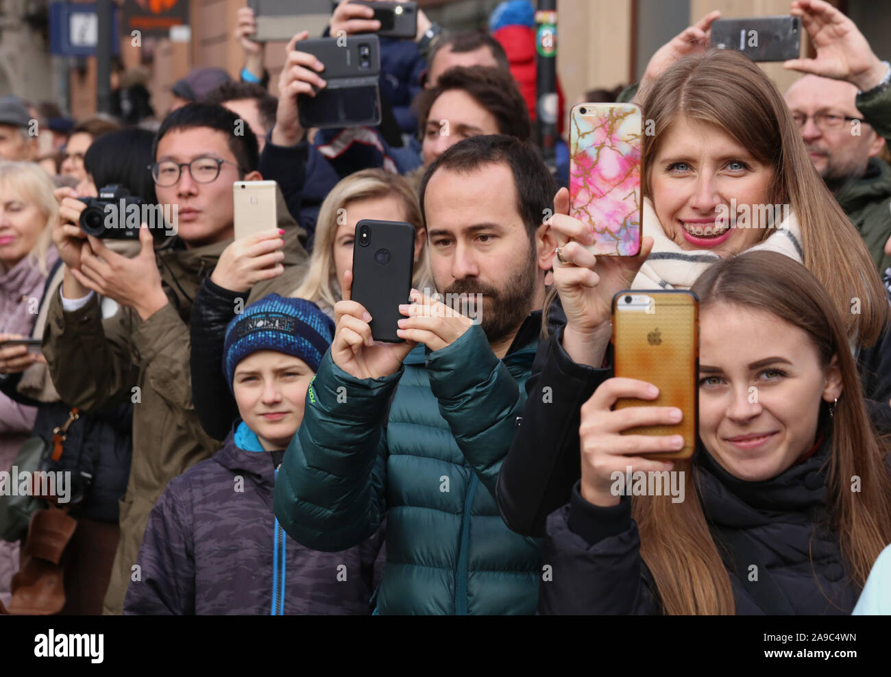 Cracow Krakow Poland People Taking Pictures With Cellphones Stock Photo Alamy