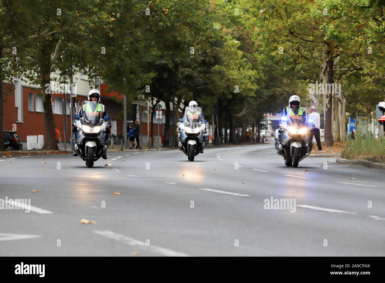Berlin, Berlin / Germany, September 15, 2018. Berlin police officers on motorcycles securing the Inline Scater race as part of the Berlin Marathon. Stock Photo