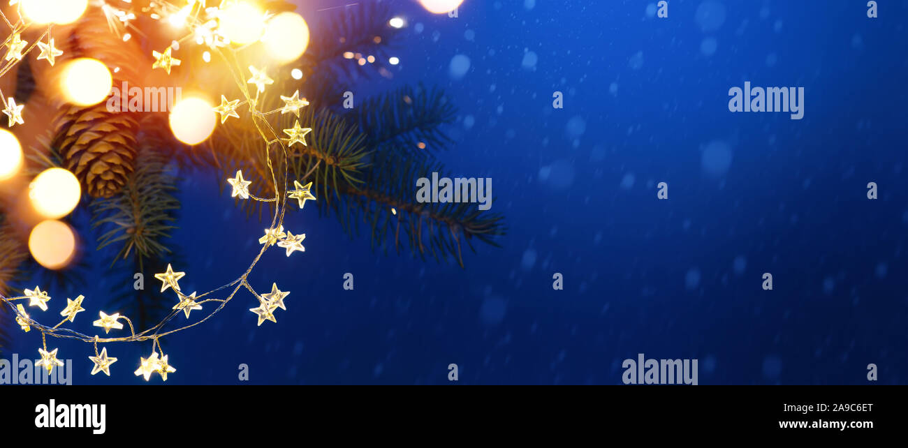 Christmas Background Xmas Fir Tree Branch With Garland Lights