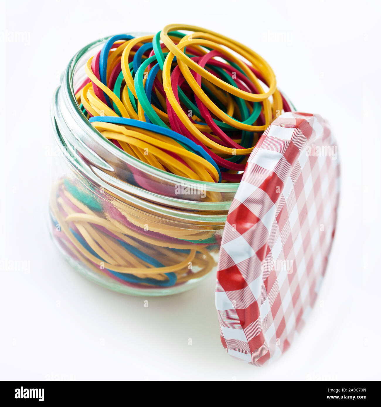Rubber bands and jar Stock Photo Alamy