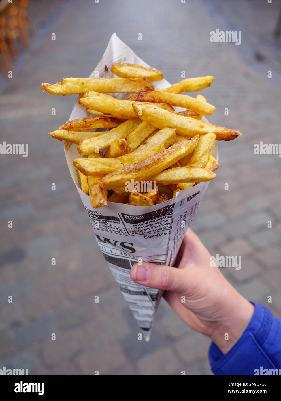 Bag of Belgian fries or frites in Brussels, Belgium Stock Photo