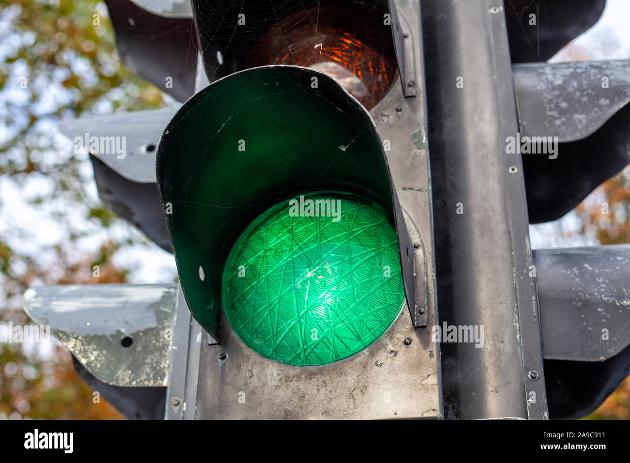 Vintage traffic light with a green light Stock Photo