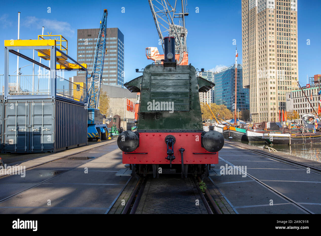 Rotterdam, Netherlands. A old locomotive and old cranes that are part of the maritiem museum in Rotterdam Stock Photo