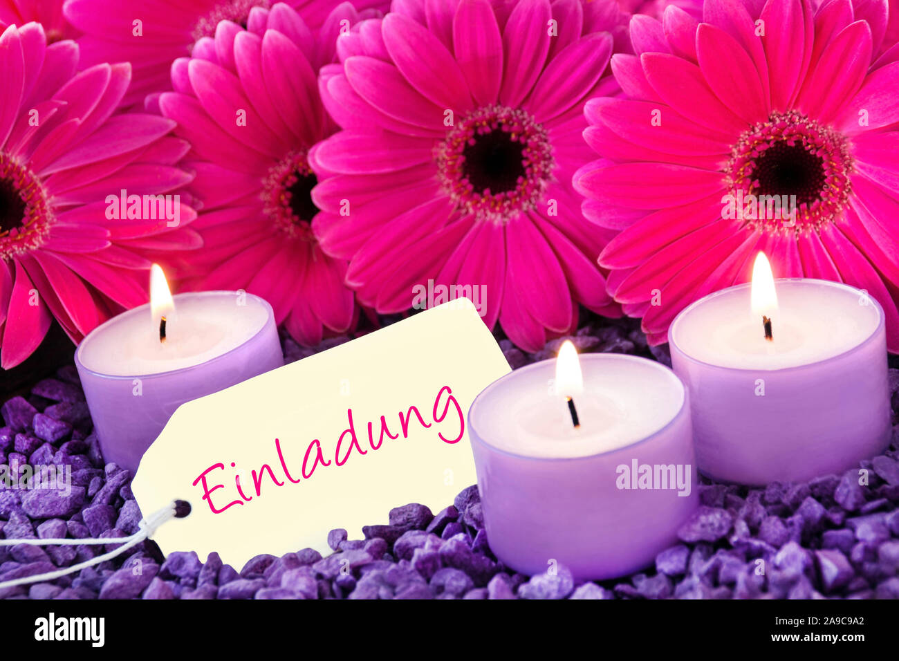 German invitation card and flowers with candles Stock Photo Alamy