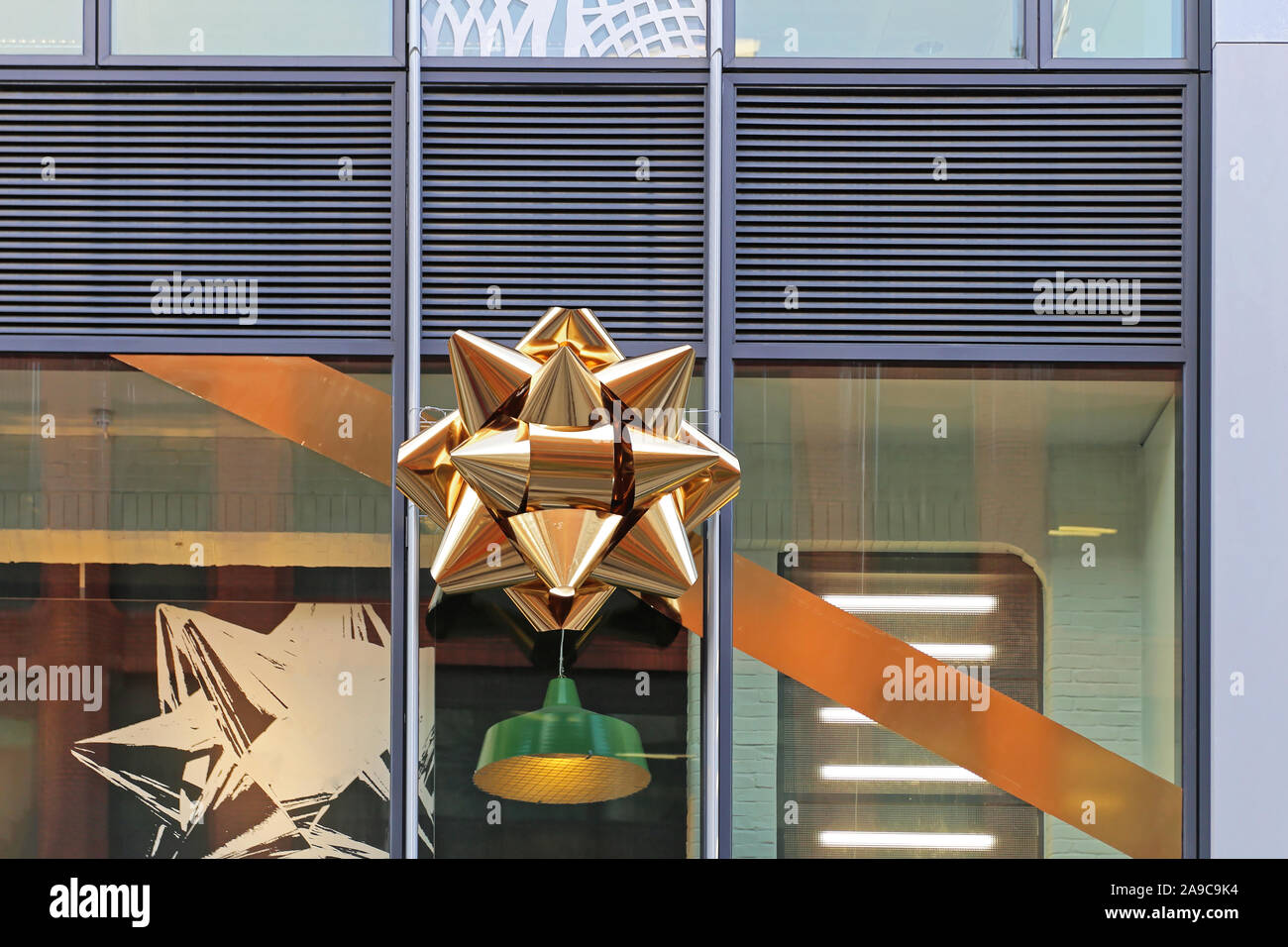 Gold ribbon big bow hi-res stock photography and images - Alamy