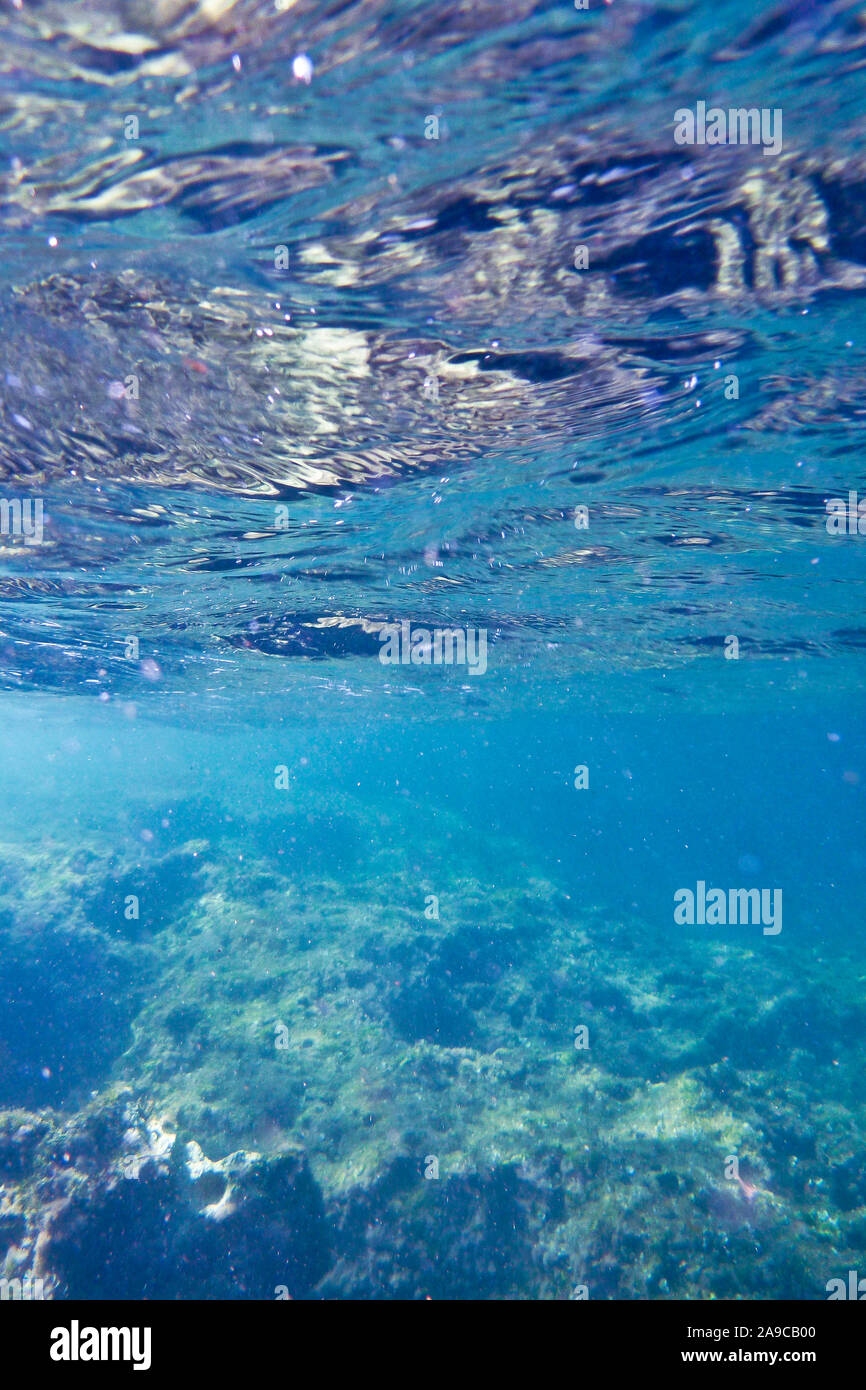 Sandy bank on the seabed below cliffs at Bahar ic-Caghaq in Malta Stock Photo